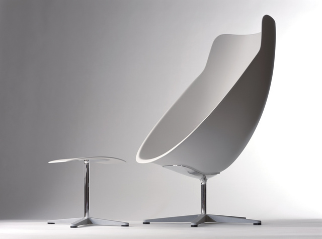 Light Lounge chair and ottoman.