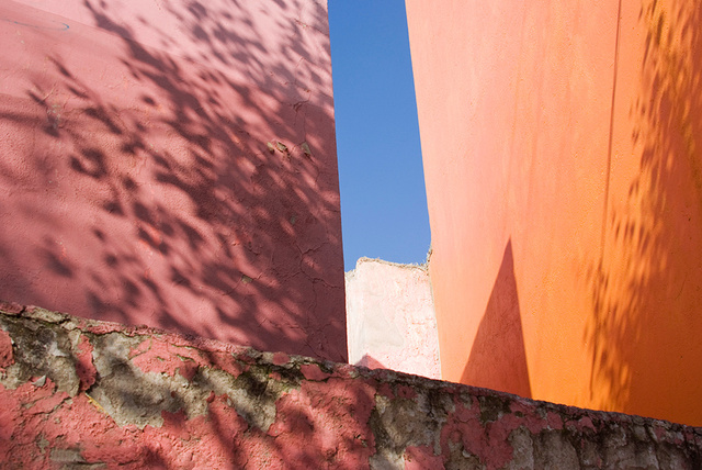 Shadows, rose & orange wall