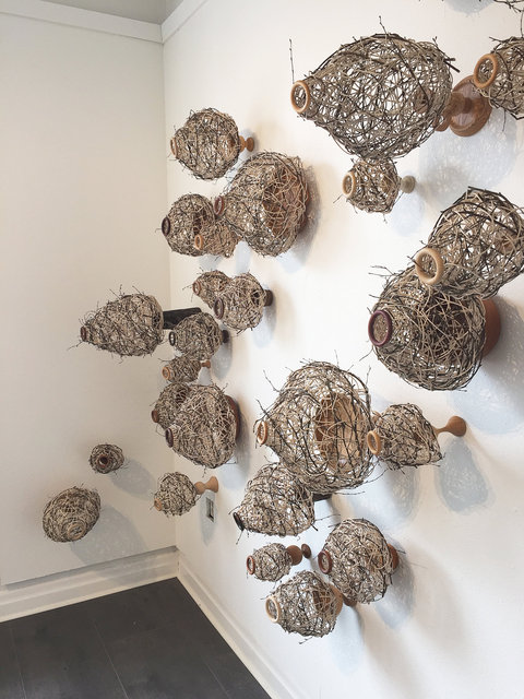 Installation made of wooden objects and rattan. 2015