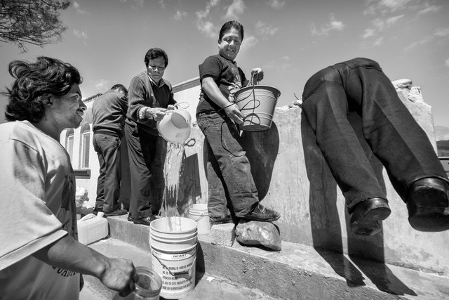 Getting water, Dia de los Muertos