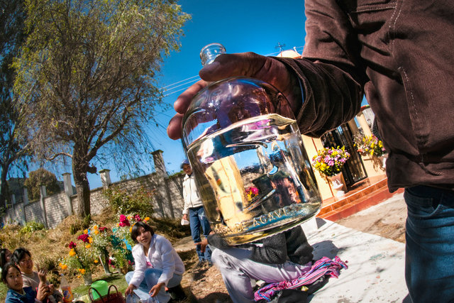 Sharing mezcal, Dia de los Muertos