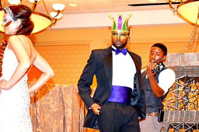 ELOPE TO PARIS fashion finale in mask, serenaded by DANIEL L. DAVIS.