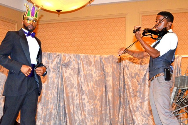 ELOPE TO PARIS fashion show featuring a recording artist /violinist DANIEL L. DAVIS.