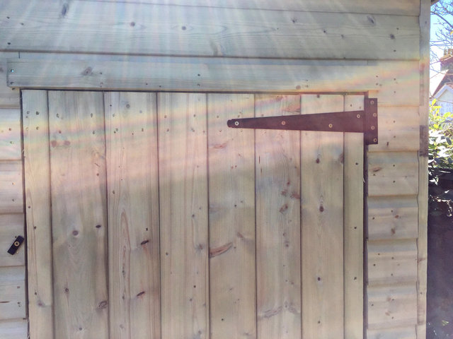 Photo showing poor quality of door and gap down side