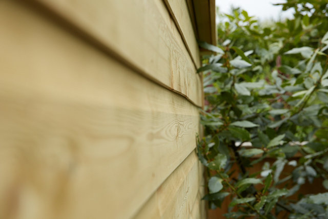 Warped side of shed - shown to inspector on April 24th