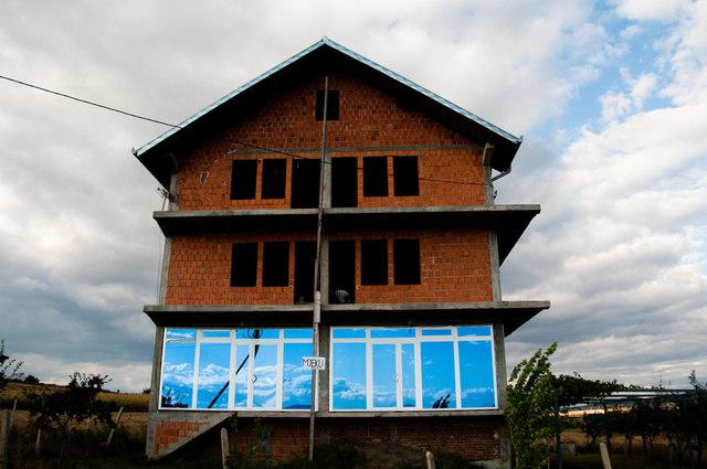 Like mirrors on a house in Kosovo