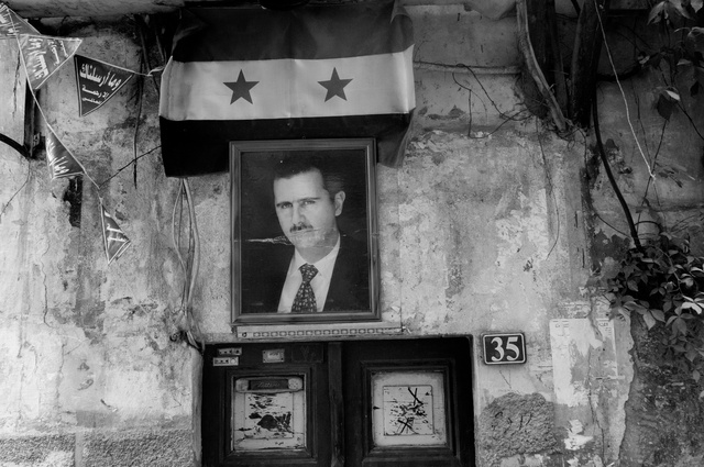 Portrait of Assad in the old city of Damascus