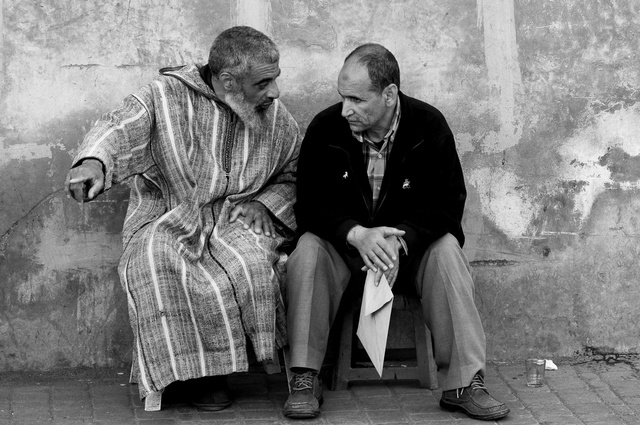 Two men in discussion