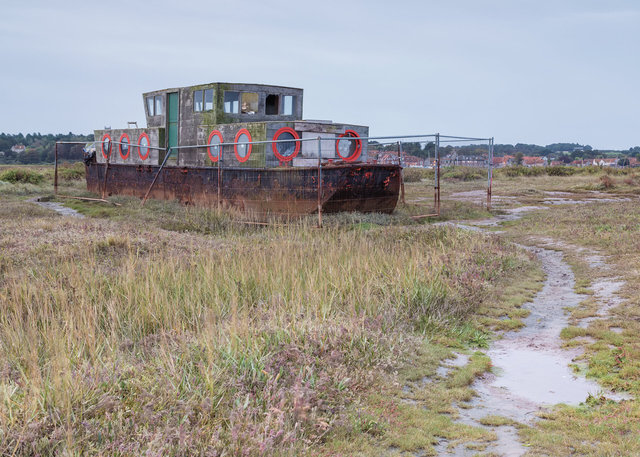 Old sand dredger in salt marshes, Blakeney