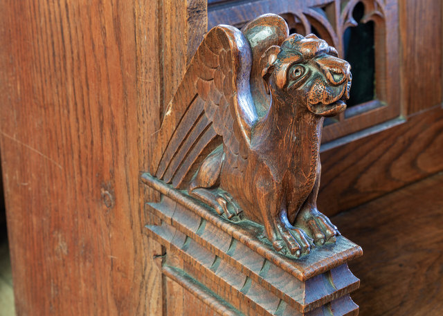 Carved bench end at St Nicholas Church, Blakeney
