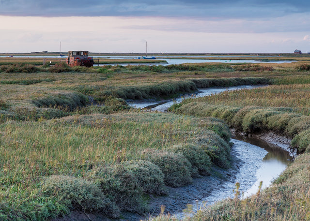 Muddy creek and derelict vessel, Blakeney