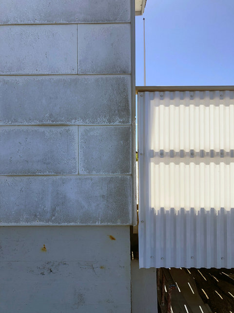 4_blue house shadow w flag pole copy.jpg