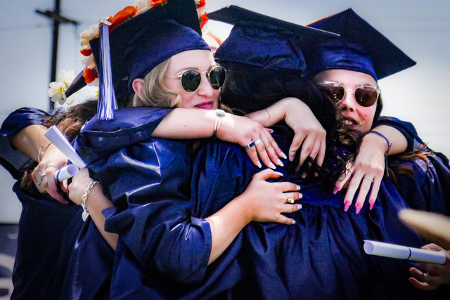 Graduation group hug