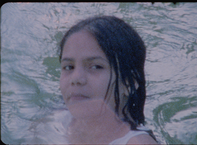 Passer-by: Between Azure, Bisque and Teal, super 8mm film transferred to 16mm film, 20 minutes film projection on loop, colour, optical sound, 2008