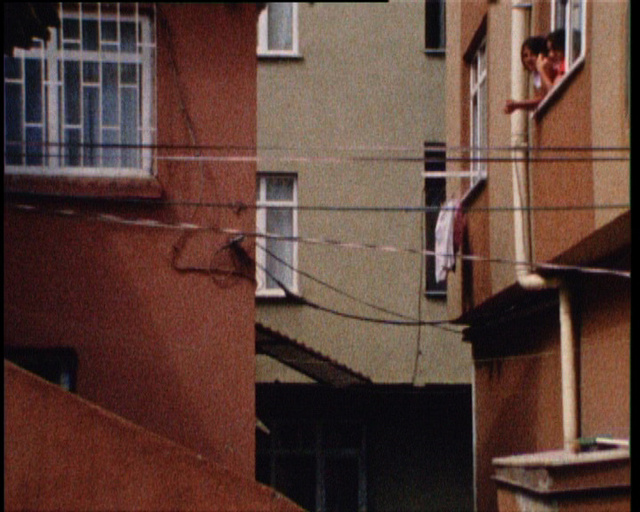 Passer-by: Between Azure, Bisque and Teal,   super 8mm film transferred to 16mm film, 20 minutes film projection on loop, colour, optical sound, 2008 