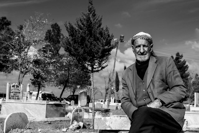 Man in the cemetery, Mesher, Turkish Kurdistan 2014