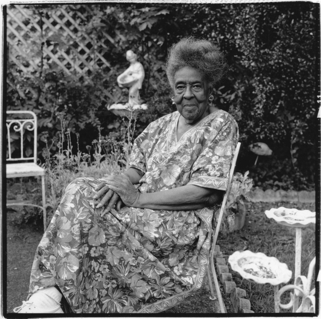 Mama in yard w. statue.jpg