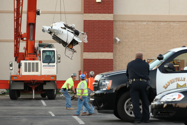 Small Plane Crashes into Fitness Center