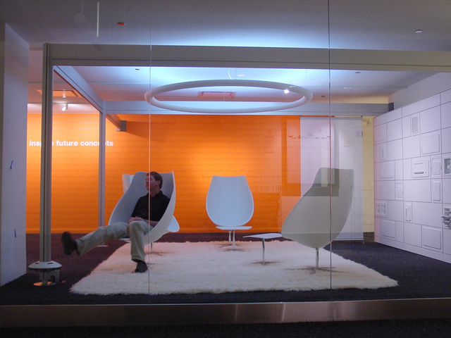 Light Lounge chair and ottoman.