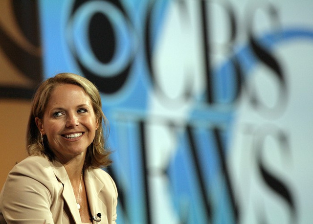 82309-news-anchor-couric-smiles-during-panel-discussion-in-pasadena.jpg