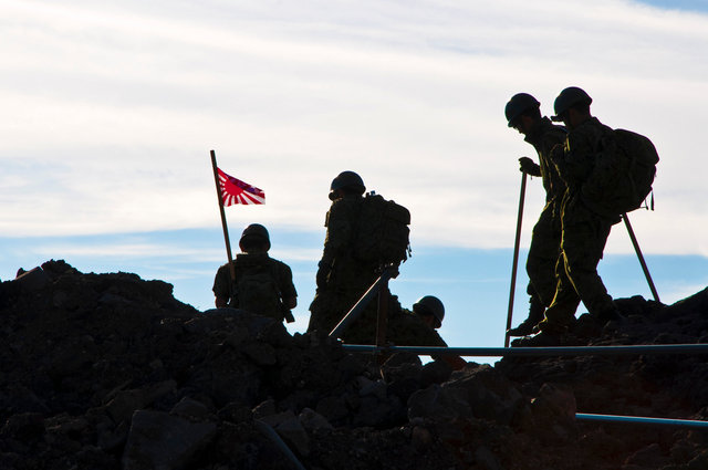 Japanese soldiers on top of Mount Fuji
