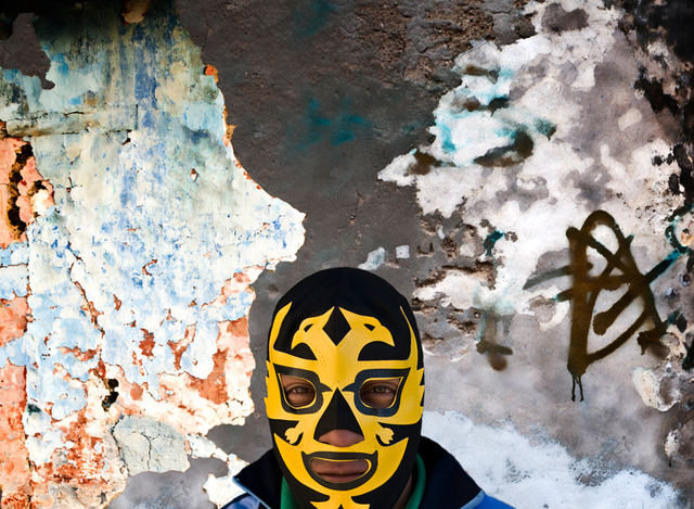 against the wall