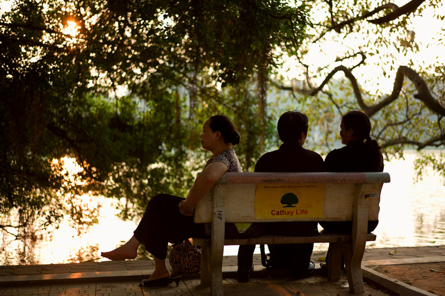 Ladies at the Hoan Kiem lake in Hanoi