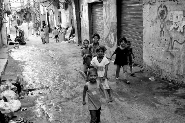 Children playing in a street in Chatila camp