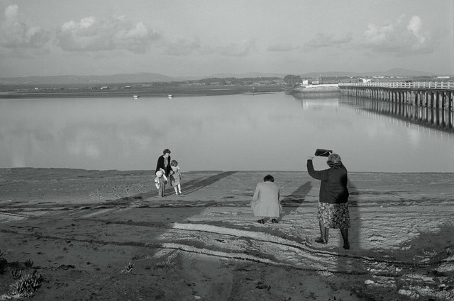 Family being photographed on beach Faro, Portugal.jpg