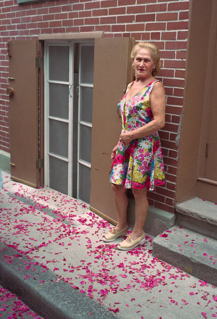 Woman in flowered pattern dress with rose peddles July 21, 1997.jpg