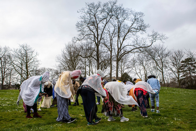 Orthodox Christians in prayer during corona pandemic in public park