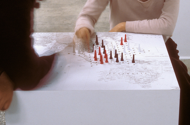 One After Another, Chinese checkers on a world map, 2004 