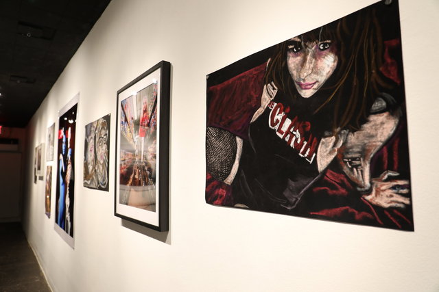 Installation view: Natalya in fishnets and clash t shirt, 2016, Oil Pastel on black velvet paper, 20 x 30 in.