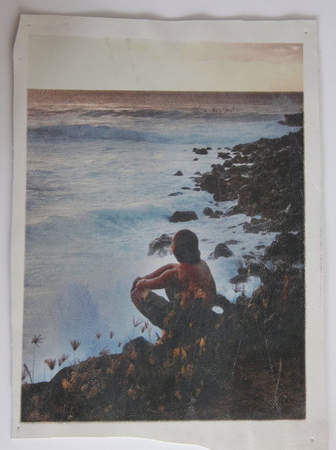 Katrina del Mar: Boy watching surfers, Waimea Bay. 15 x 12 in archival pigment print on white leather