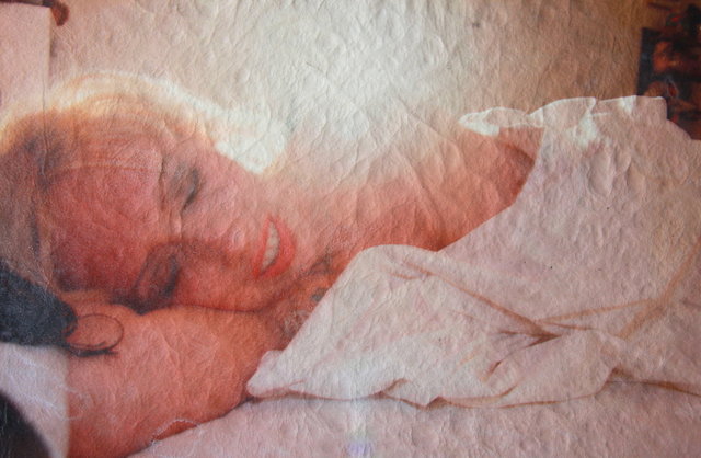 Katrina del Mar: Tessa in bed backlit archival pigment print on white calfskin 12x16” irregular shape