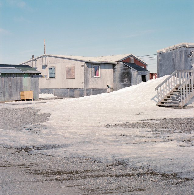 The spring sun melts the snow in the village, 2017