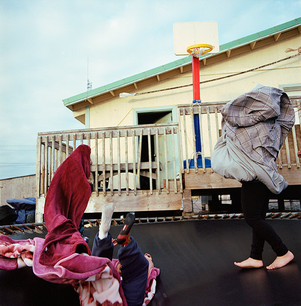 Playing with blankets on the trampoline, August 2016