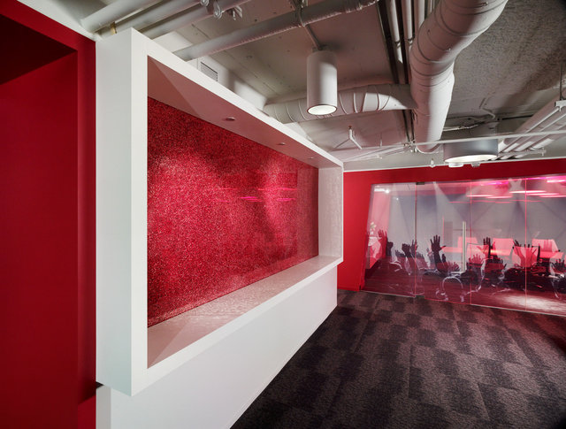 Open space with conference room wrapped with photo image.