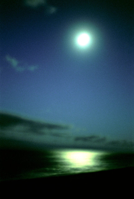 Turquoise Moon Over The Sea