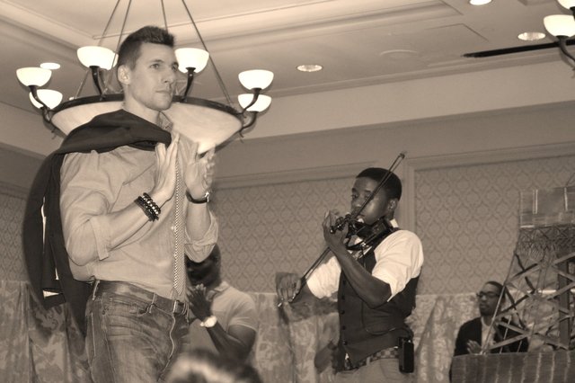 ELOPE TO PARIS fashion show. Violinist DANIEL L DAVIS serenades.