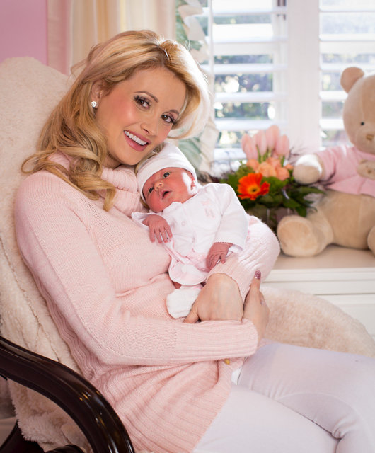 HOLLY MADISON WITH HER DAUGHTER RAINBOW at 1 week old
