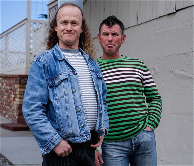 Men in Striped Pullovers