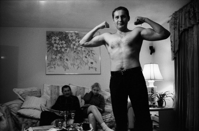 My cousin in the living room of his parents house.