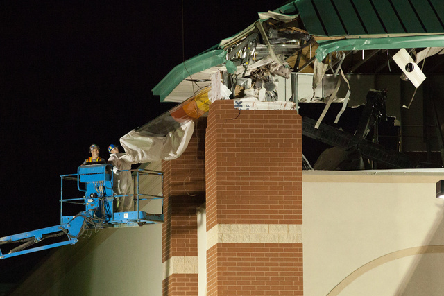 Small Plane Crashes into Fitness Center