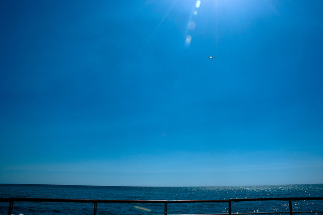 Plane in a blue Lebanese sky and sea