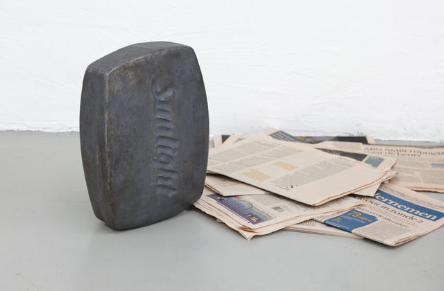 Pink News, Massive Sunlight, 2013, cast iron, financial newspapers. Installation view SET.