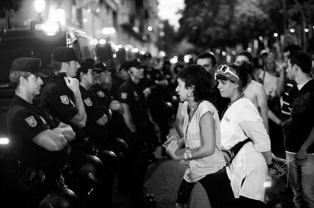 Los Indiniados confronting police near the Ministr