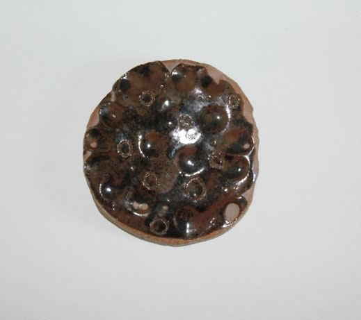Round Stoneware fired glazed coaster by Alison Gracie