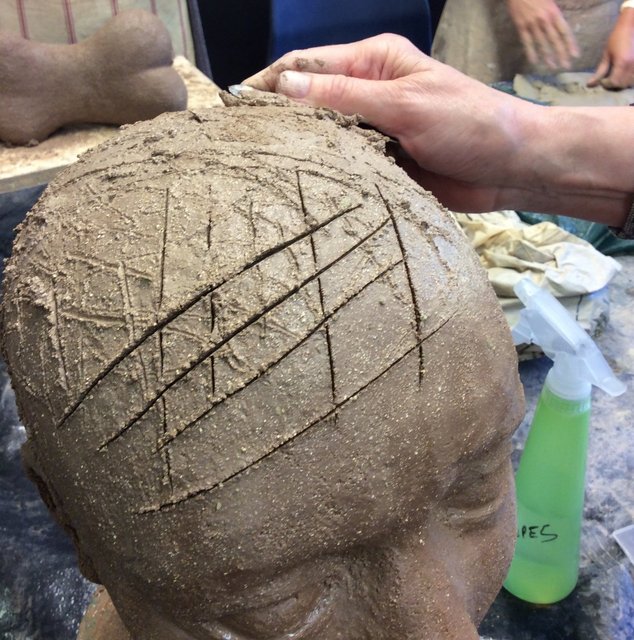 Adding of new clay not the source and dampened surface -