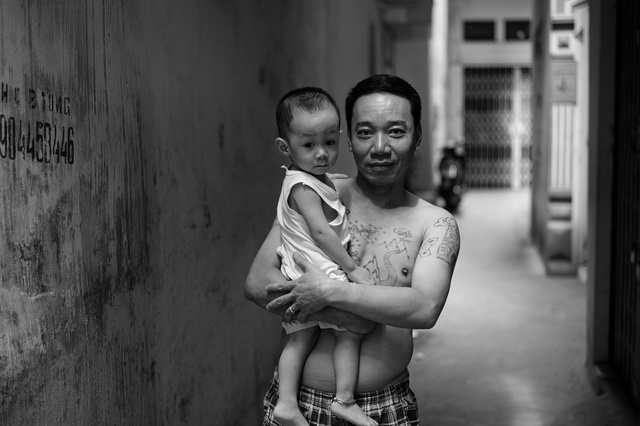 Young father with his boy in Hanoi